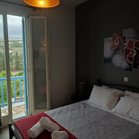 Andros Guesthouses Extérieur photo