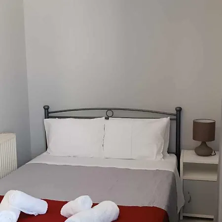 Andros Guesthouses Chambre photo