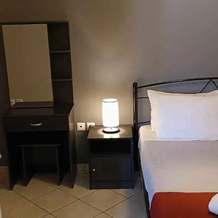 Andros Guesthouses Chambre photo