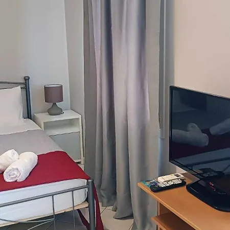 Andros Guesthouses Chambre photo