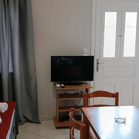 Andros Guesthouses Chambre photo